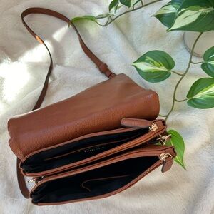 Camel faux leather crossbody bag with dual main zipper pockets